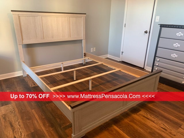 Wood bed frame set up in Pensacola, Florida