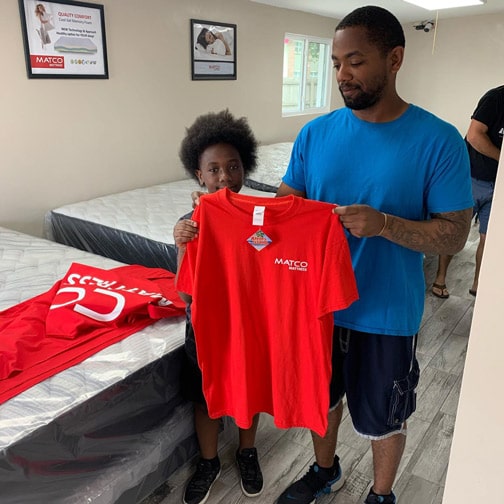 Men and kid in Mattress store - West Pensacola Fl